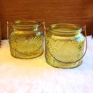 2 yellow/green glass tea light or fairy light lanterns